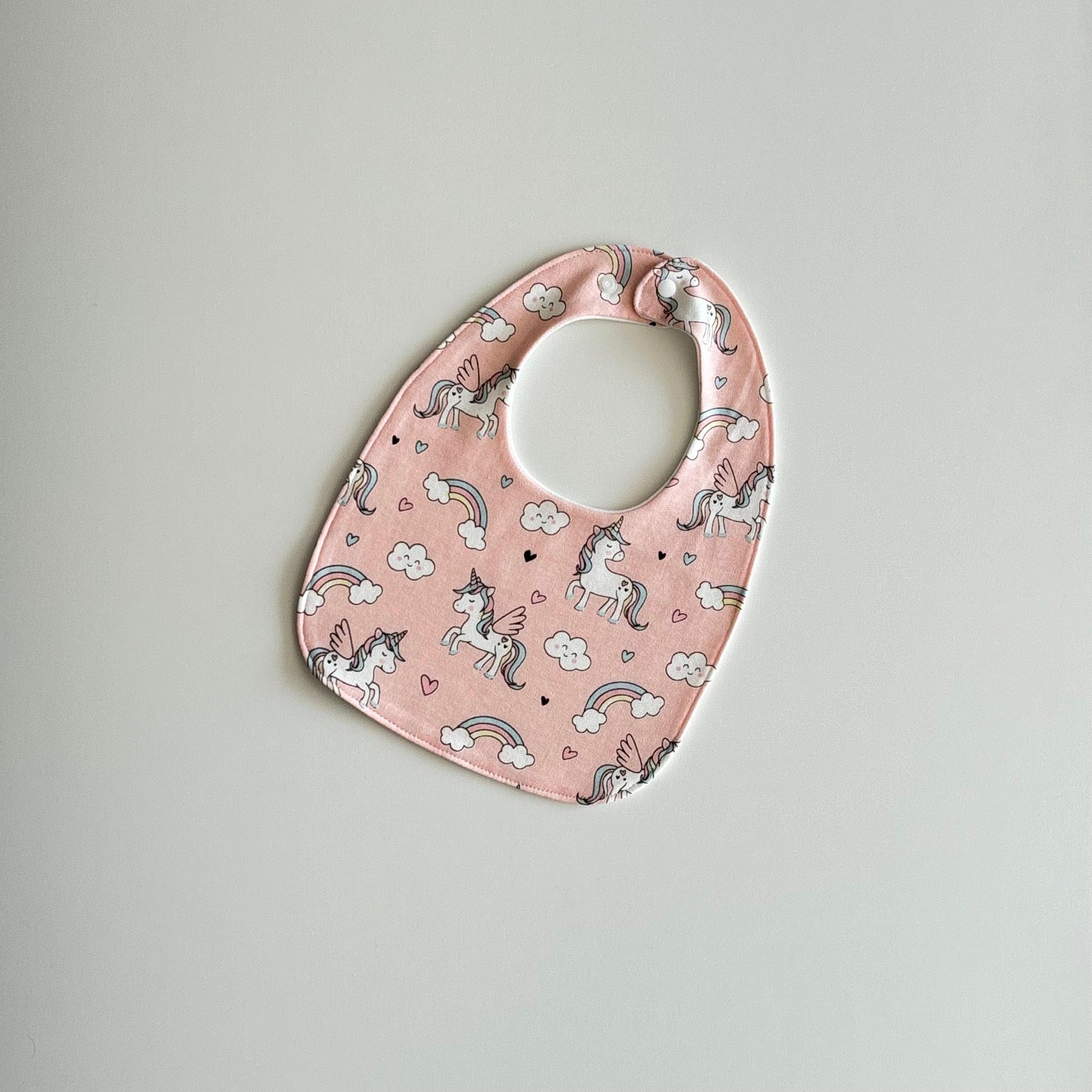 Shimmering unicorn feeding bibs 